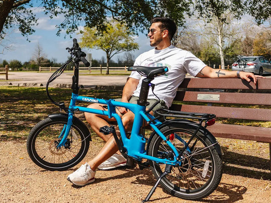 Man sitting by blue Flippo bike