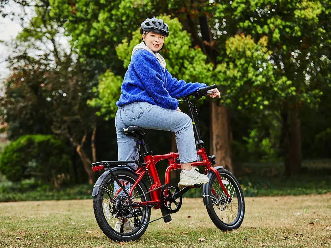 Woman riding red Flippo folding ebike in park