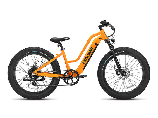 Studio side view of orange Fastron ST fat tire e-bike with cargo rack and comfort saddle