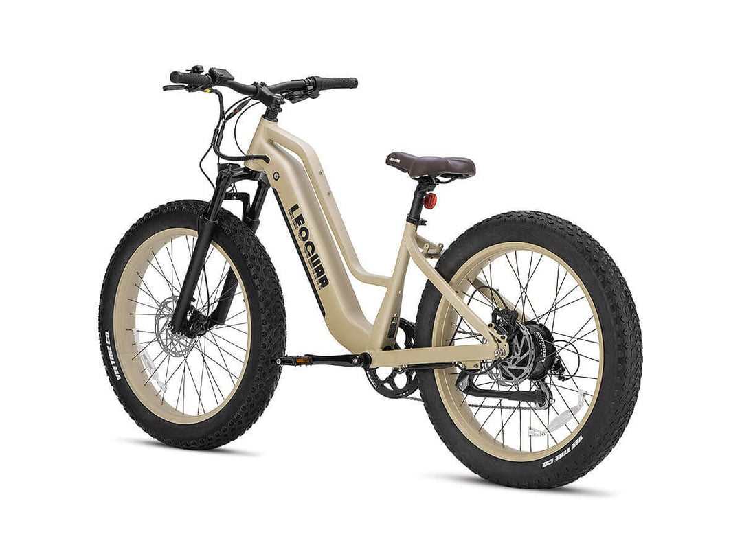 Rear-side studio view of tan Fastron ST electric bike with wide tires