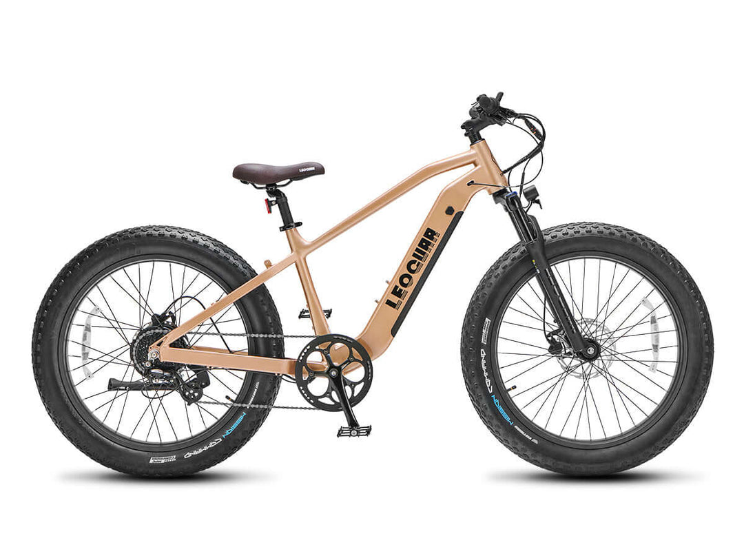 Tan version of Fastron SO fat tire electric bike parked on urban walkway