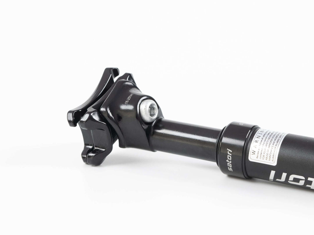 Close-up of Suspension Seatpost | Zephyr showcasing its design and components for improved riding comfort.