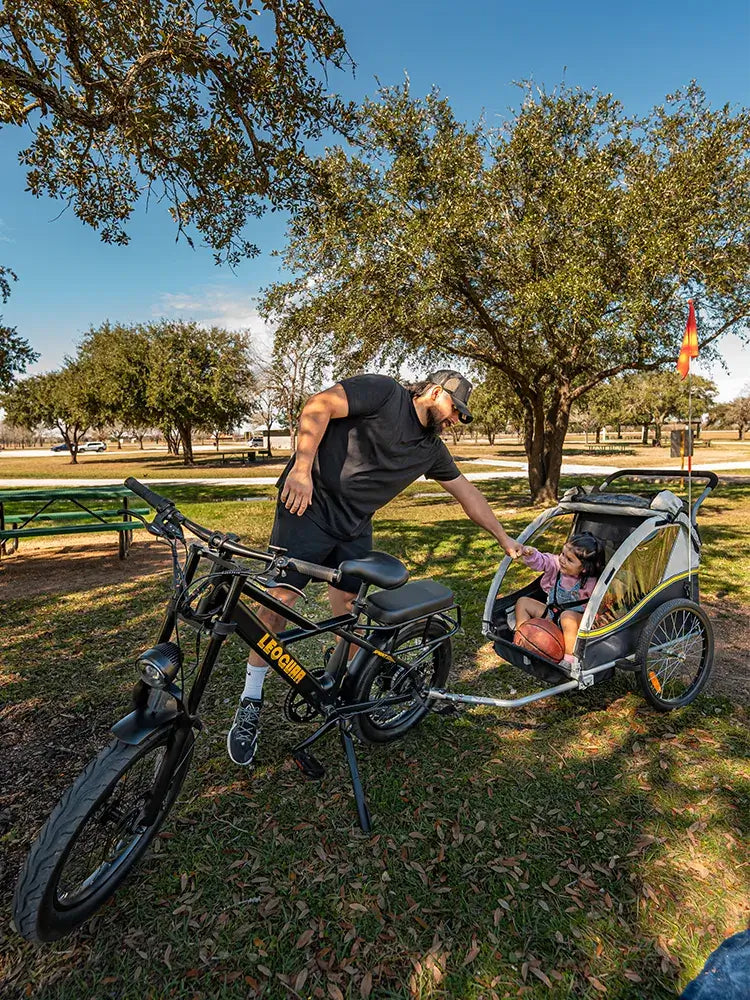 Leoguar electric bike with child trailer in family park ride
